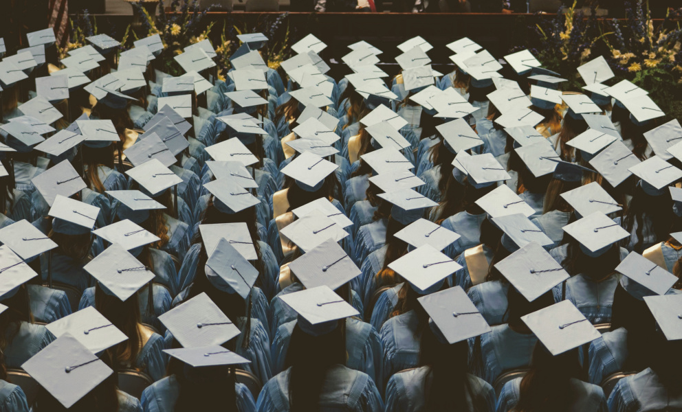 A group of students with graduation caps
